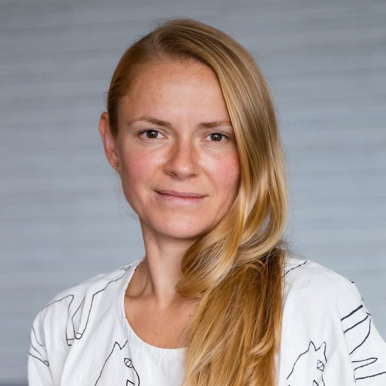 Headshot of Kaja Wasik, grey background