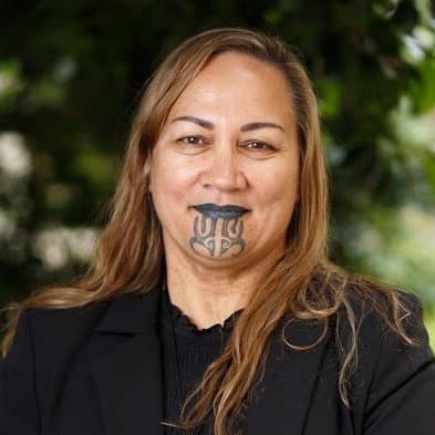 A headshot of Huti Watson