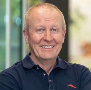 A headshot of Rob Scott